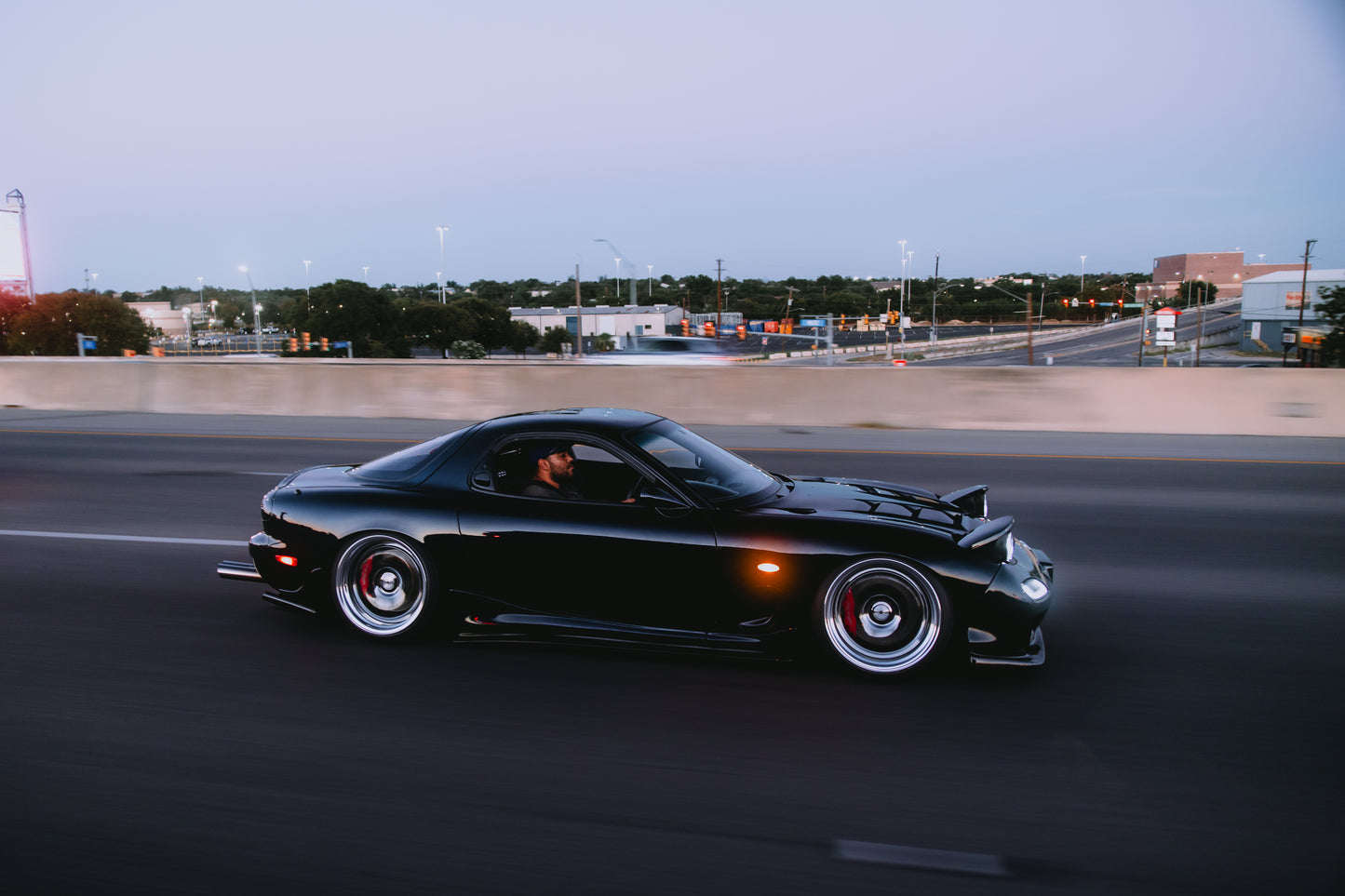 Mazda RX-7 FD3S driving with Wilwood brake upgrade and aftermarket wheels