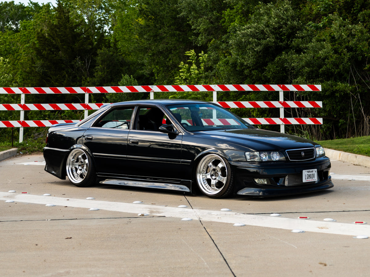 Custom air suspension installation on lowered sedan in Houston Texas