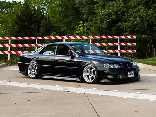 Custom air suspension installation on lowered sedan in Houston Texas