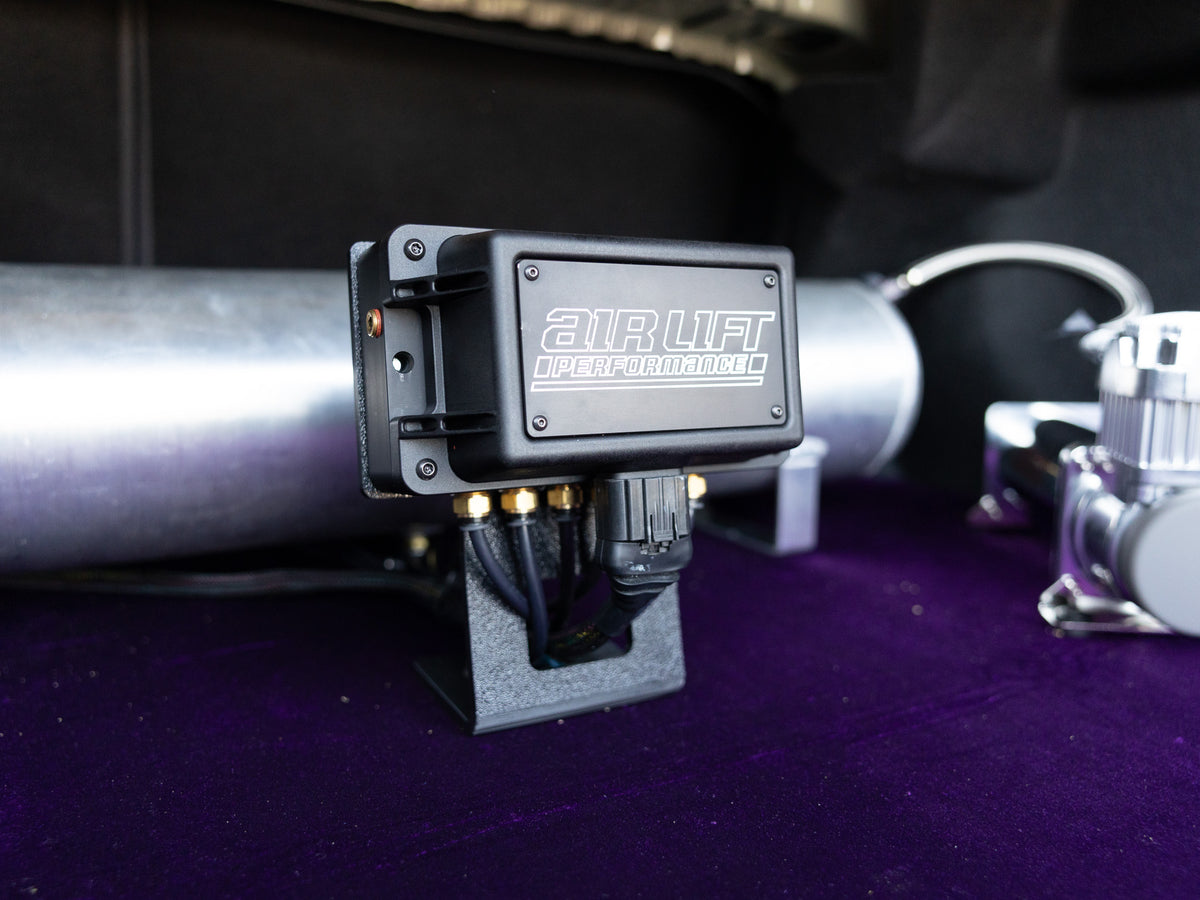 Close-up of Air Lift Performance air management manifold installation