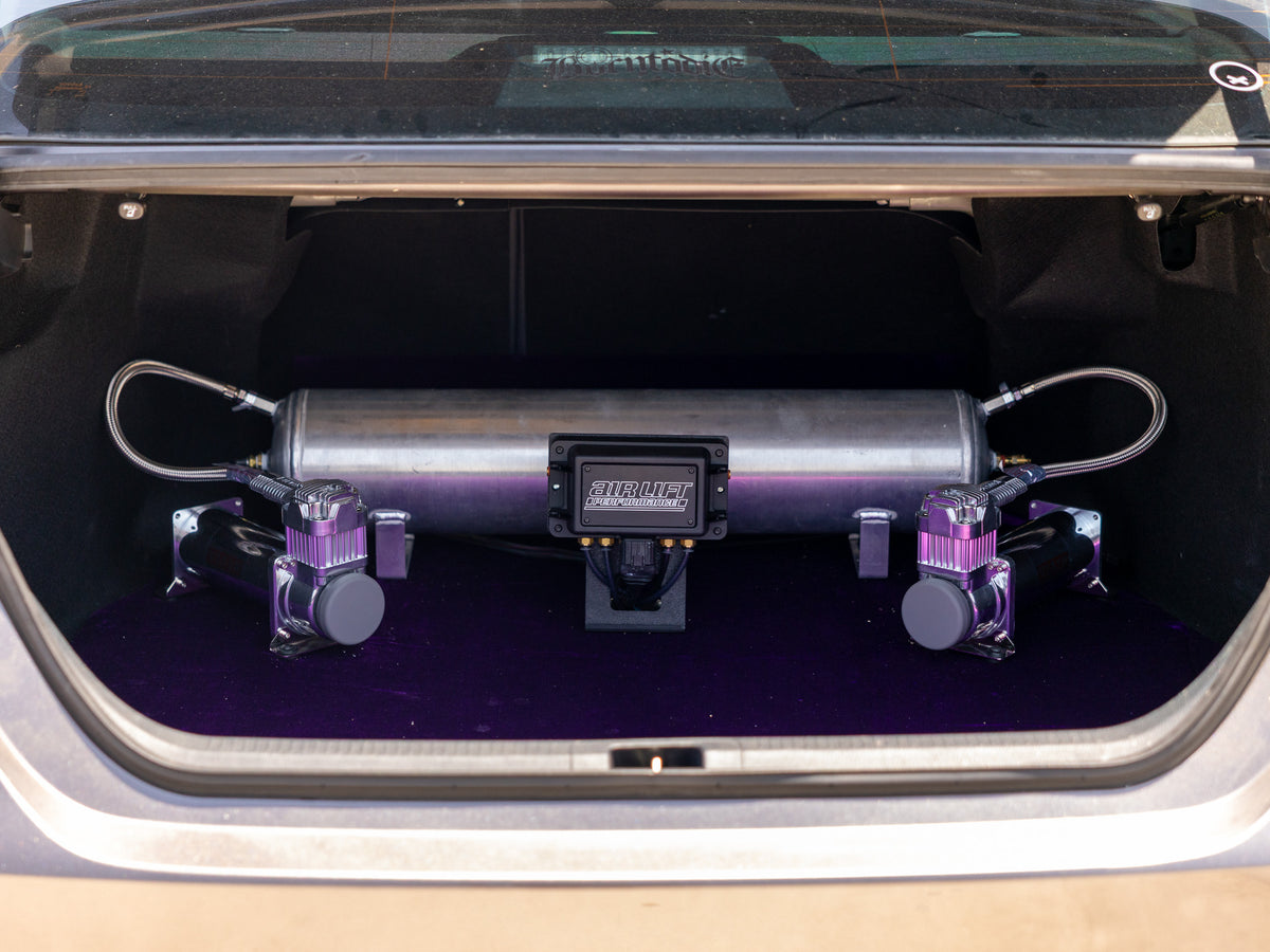 After air suspension rework with custom dual compressor trunk setup