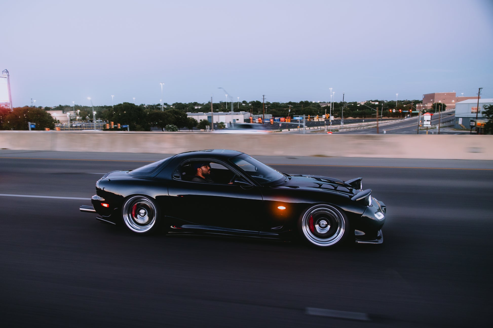 Mazda RX-7 FD3S driving with Wilwood brake upgrade and aftermarket wheels