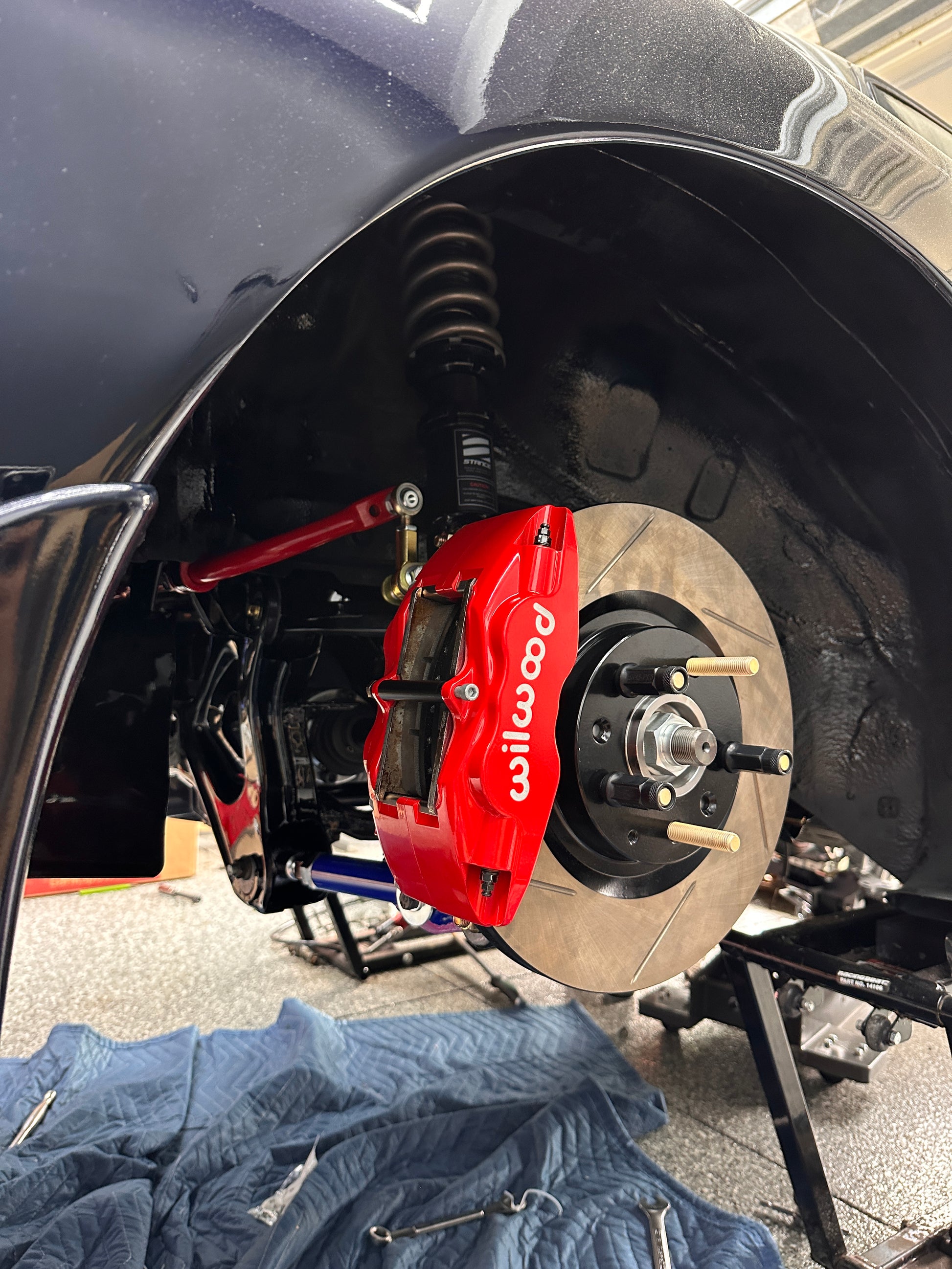 Wilwood Forged Superlite rear caliper installed on FD3S RX-7 with RX-8 Sport rear rotor