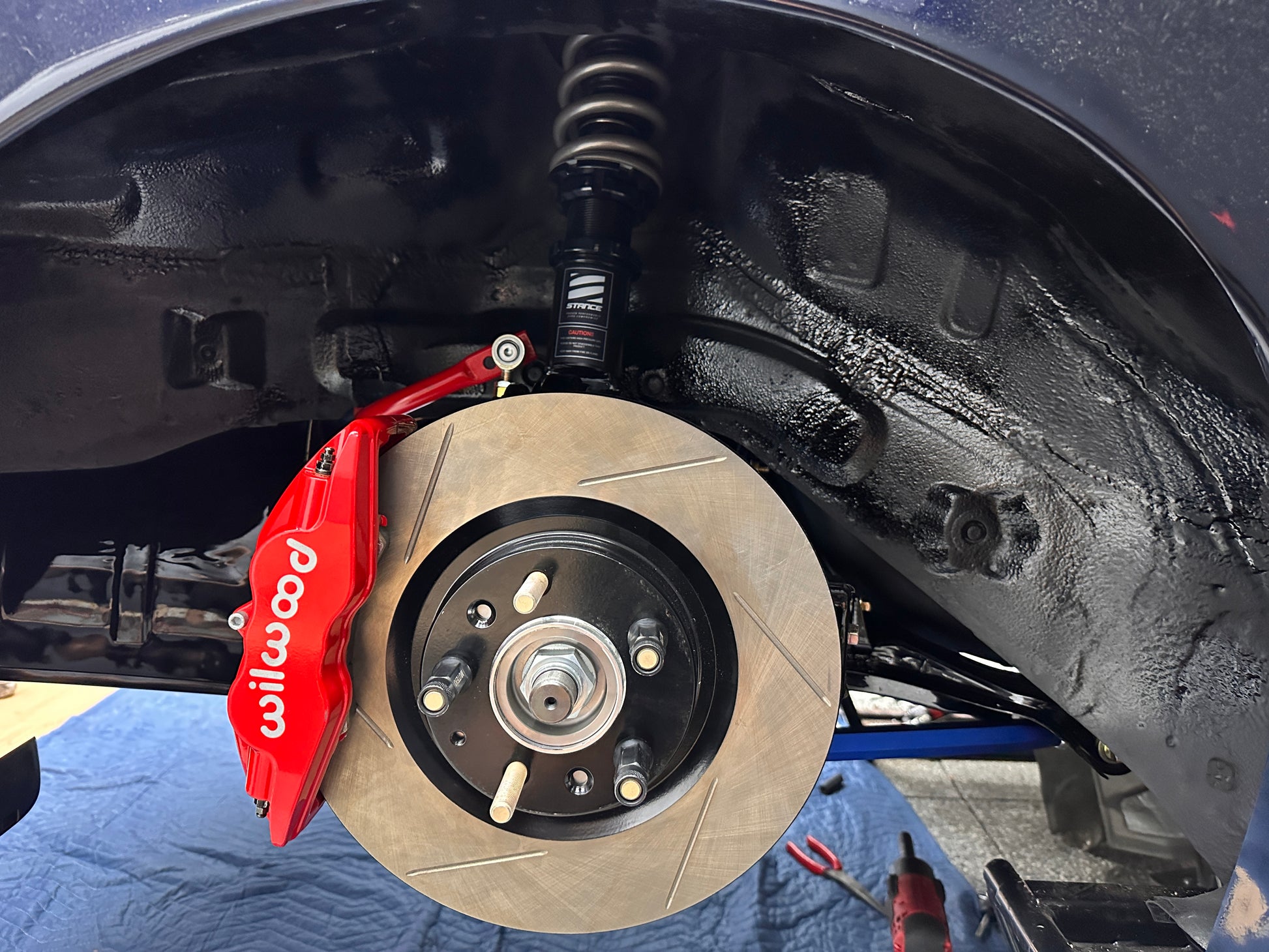 FD3S RX-7 rear brake conversion using Wilwood Superlite caliper and RX-8 Sport rear rotor